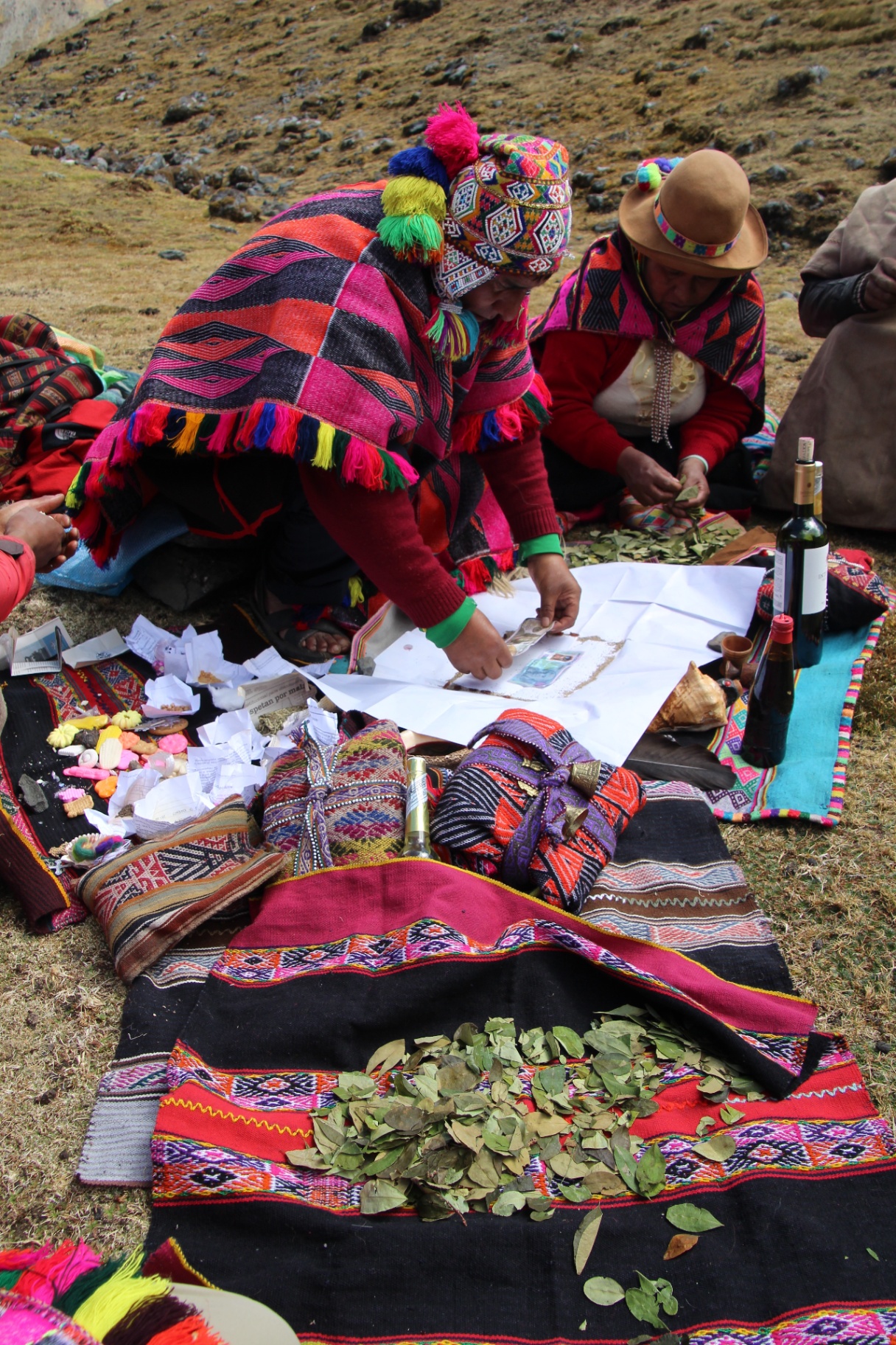 Q'ero shamans preparing a Despacho ceremony in the high Andes