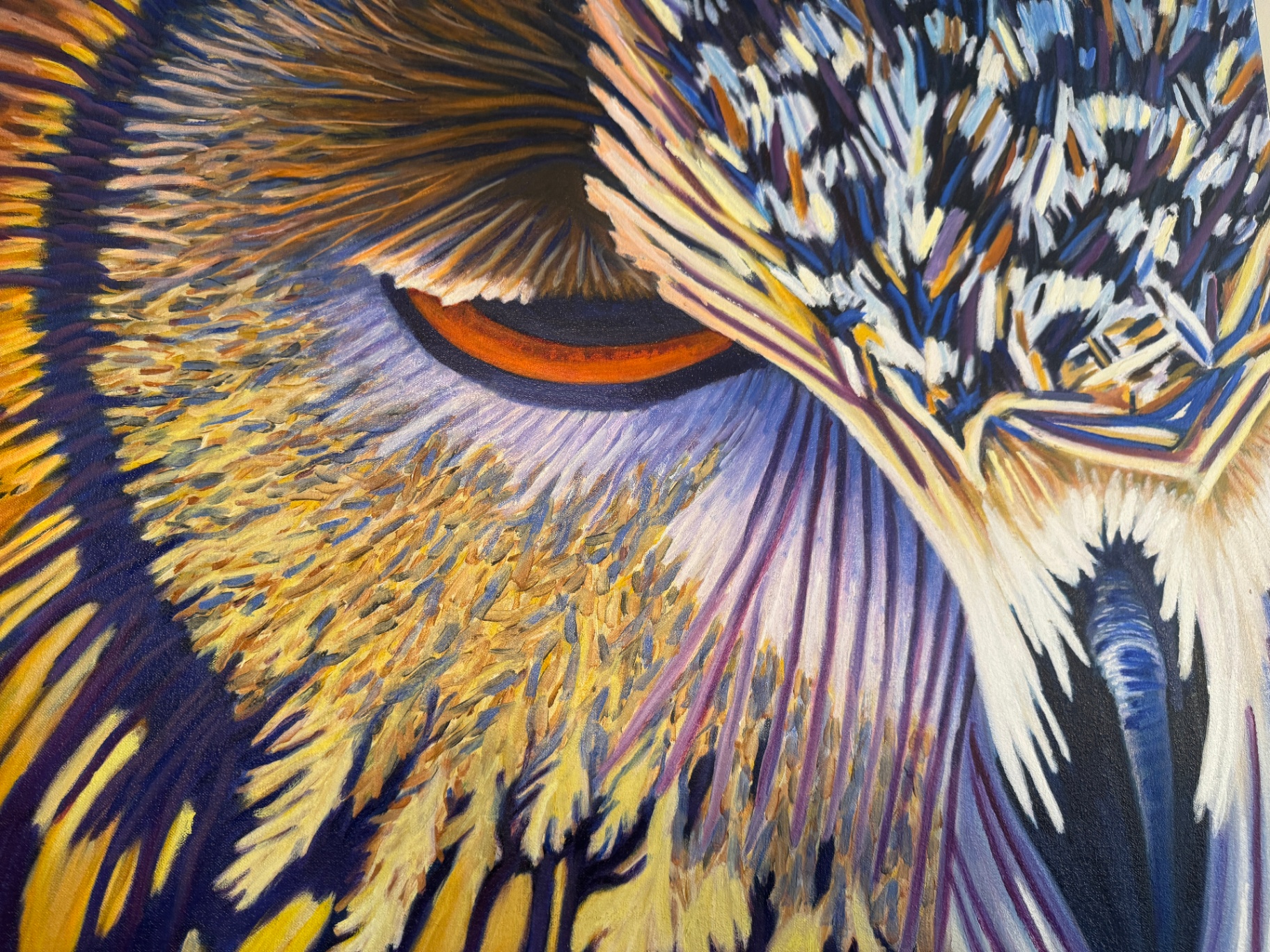 Painting of an eagle's eye in vivid color