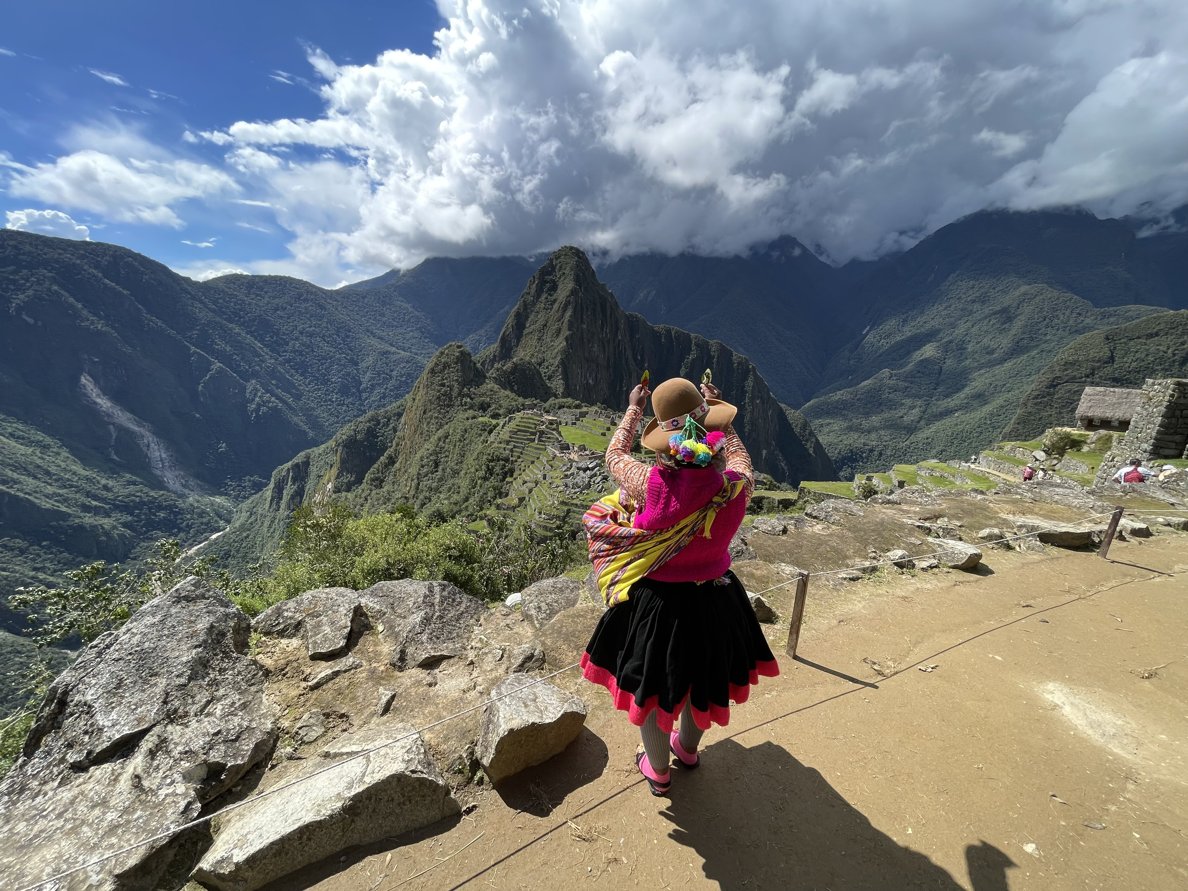 A gathering at a sacred Andean mountain site beneath dramatic peaks — Shamanic Trekker