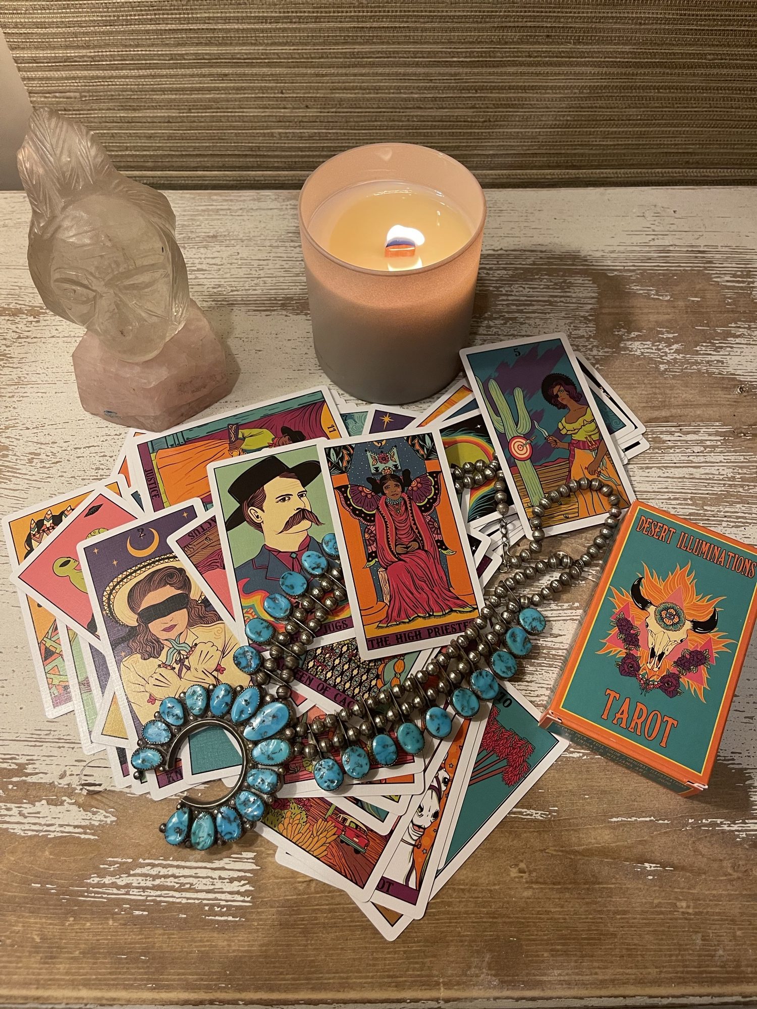 Tarot cards, crystals, and a squash blossom necklace used in Kristen White's Soul Guidance Sessions