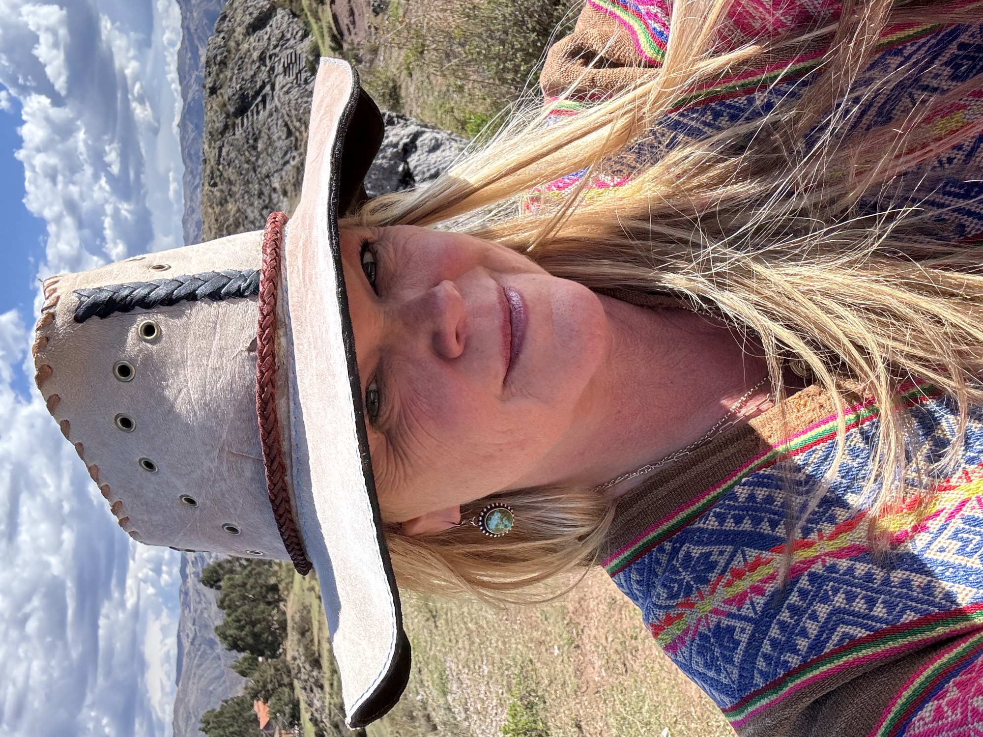 Kristen White in ceremonial dress in the high Andes of Peru
