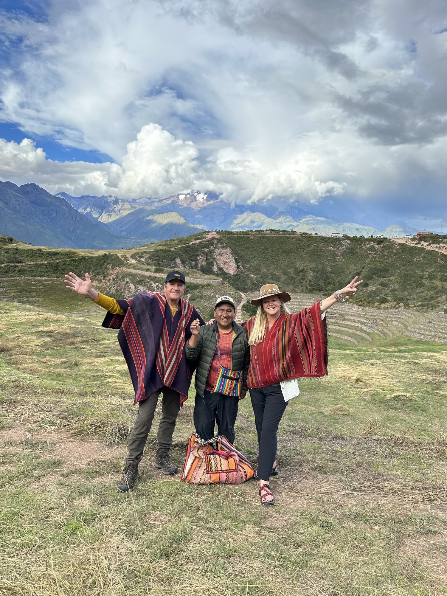 John Whitehorse and Kristen White celebrating with a Q'ero shaman above the Sacred Valley