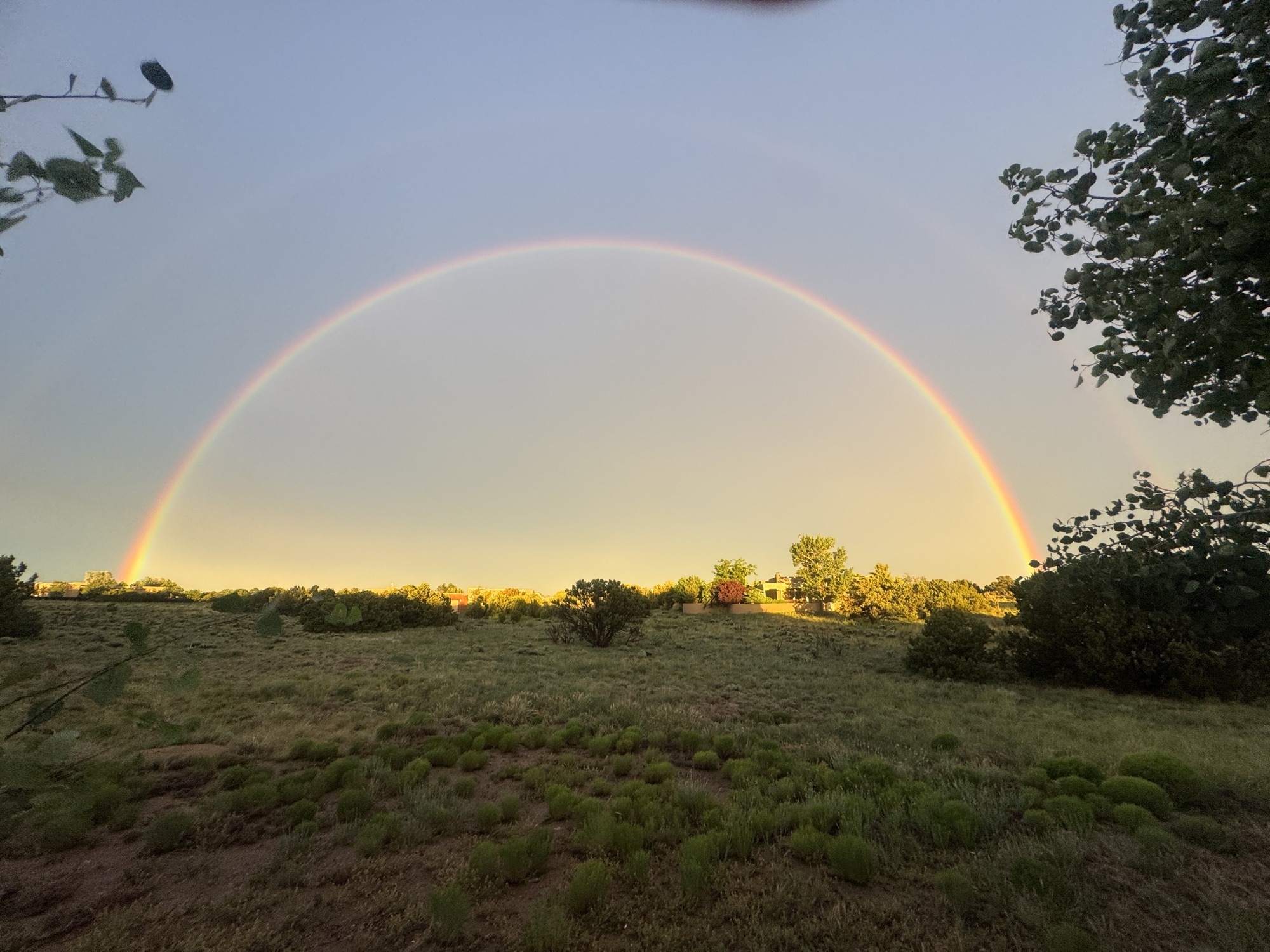 A double rainbow over the Santa Fe landscape - Shamanic Trekker